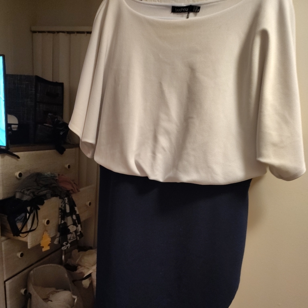 Dark blue skirt and connected white top office siren, corp.core, pretty women